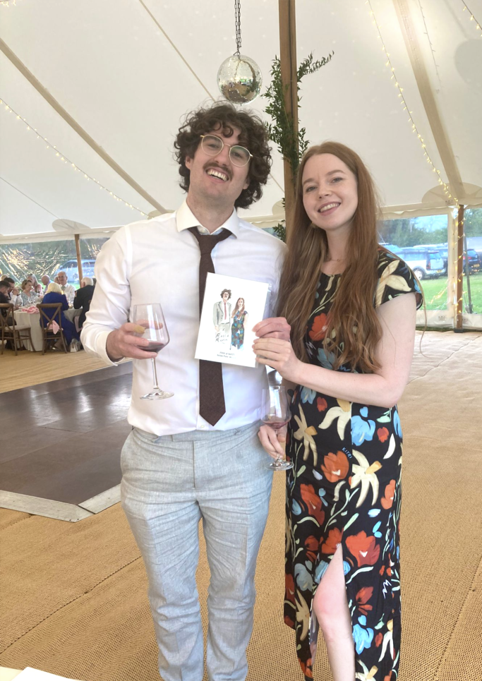 couple poses with live portrait painting